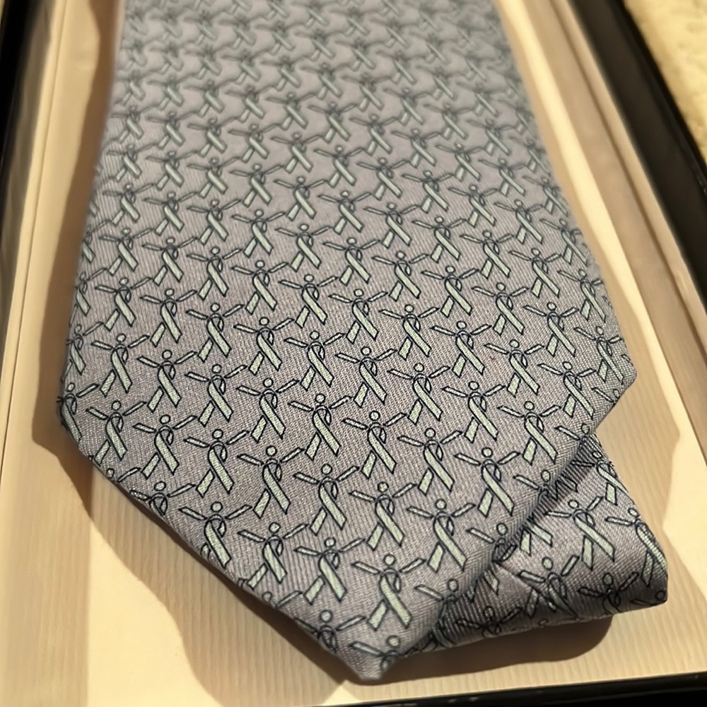 Vineyard Vines light blue breast cancer awareness tie.